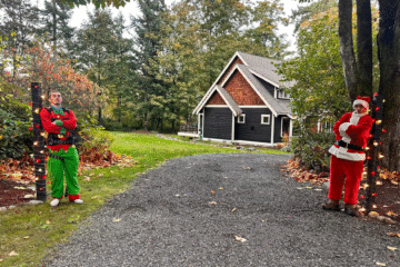 The Johnny Tsunami team ready to install holiday lights.