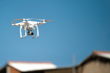 Drone hovers over homes
